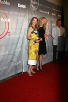 Annette Bening  Meg Ryan arriving at the 2008 Crystal  Lucy Awards at the Beverly Hilton Hotel in Beverly Hills, CA June 17, 2008 photo