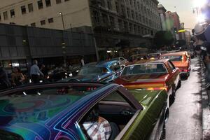 LOS ANGELES - AUG 25  Vintage Low Rider Cars arrives at the Machette  Premiere at Orpheum Theater on August 25, 2010 in Los Angeles, CA photo