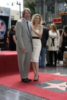 David E. Kelley, Michelle Pfeiffer Michelle Pfeiffer Walk of Fame Ceremony Hollywood Walk of Fame Hollywood  Highland Los Angeles, CA April 3, 2007 photo
