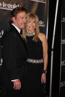 Chuck  Gena Norris arriving at the Movieguide Family Awards 2009  at the Beverly Hilton Hotel in Beverly Hills, CA on  February 11, 2009 photo