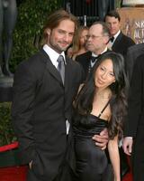 Josh Holloway and guest 12th Annual Screen Actors Guild  Awards Shrine Auditorium Los Angeles, CA January 29, 2006 photo