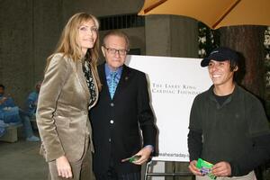 Shawn  Larry King at the Larry King Cardiac Foundaton Booth with volunteerCOPE Road to Health FairKeck School of Medicine of USCLos Angeles  CANovember 8 2007 photo