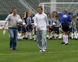 David Beckham demonstrates soccer skills for children after press conference to announce Soccer Academy beginning in Fall 2005 at the Home Depot Center in So California. Carson, CA June 2, 2005 photo