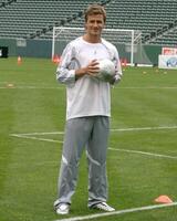 David Beckham demonstrates soccer skills for children after press conference to announce Soccer Academy beginning in Fall 2005 at the Home Depot Center in So California. Carson, CA June 2, 2005 photo