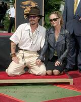 Johnny profundo vanessa paraíso huella de la mano y Huella ceremonia para Johnny profundo de grauman chino teatro los ángeles, California septiembre dieciséis, 2005 foto