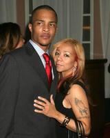 T.I. and guest 13th Annual Diversity Awards Beverly Hills Hotel Los Angeles, CA November 13, 2005 photo