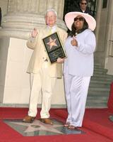 Roger Ebert and wife Roger Ebert Receives Star on Walk of Fame Hollywood Walk of Fame Los Angeles, CA June 23, 2005 photo