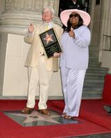 Roger Ebert and wife Roger Ebert Receives Star on Walk of Fame Hollywood Walk of Fame Los Angeles, CA June 23, 2005 photo