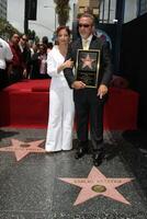 Gloria and Emilio Estefan  Emilio Estefan Star on the  Hollywood Walk of Fame Los Angeles, CA June 9, 2005 photo