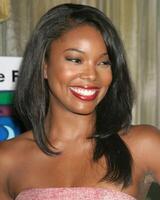 Gabrielle Union arriving at the  Family Matters Benefit. Friends of the Family Annual Gala IHO Cedric the Entertainer Regent Beverly Wilshire Hotel Los Angeles, CA June 3, 2005 photo