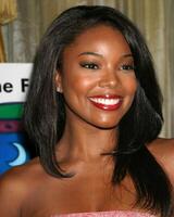 Gabrielle Union arriving at the  Family Matters Benefit. Friends of the Family Annual Gala IHO Cedric the Entertainer Regent Beverly Wilshire Hotel Los Angeles, CA June 3, 2005 photo