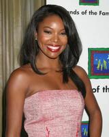 Gabrielle Union arriving at the  Family Matters Benefit. Friends of the Family Annual Gala IHO Cedric the Entertainer Regent Beverly Wilshire Hotel Los Angeles, CA June 3, 2005 photo