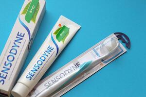 KYIV, UKRAINE - MAY 4, 2022 Sensodyne fluorine or fluor is a daily fluoride toothpaste photo