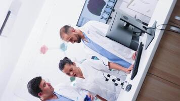 Vortex spinning shot of team of scientists in modern laboratory. Research and equipment video