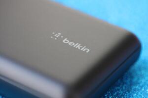 KYIV, UKRAINE - MAY 4, 2022 Portable Powerbank battery with logo of Belkin International photo