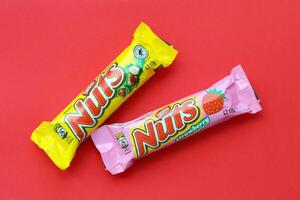 KYIV, UKRAINE - MAY 4, 2022 Nuts original chocolate bar manufactured by Nestle company photo