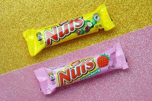KYIV, UKRAINE - MAY 4, 2022 Nuts original chocolate bar manufactured by Nestle company photo