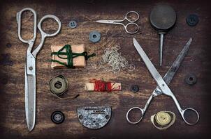 Sewing accessories on  table photo