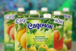 KHARKIV, UKRAINE - JANUARY 2, 2021 Sadochok various taste nectar from peach, apple and strawberry with orange flavour juice photo