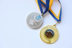 KYIV, UKRAINE - MAY 4, 2022 Medal for the person who conquered Mount Hoverla photo