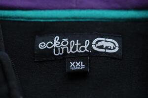 KYIV, UKRAINE - 4 MAY, 2023 Ecko Unltd company logo on new brand clothes photo