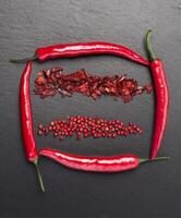 Chili pepper on a black table photo