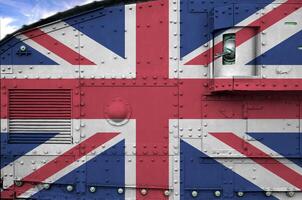 Great britain flag depicted on side part of military armored tank closeup. Army forces conceptual background photo