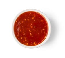 picante rojo salsa en cuenco foto