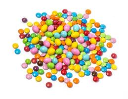 Colorful chocolate candy pills isolated photo