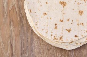 tortilla  on wooden table photo