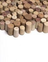 corks on white background photo