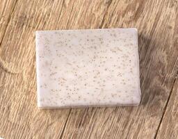 soap bar  over wooden background photo