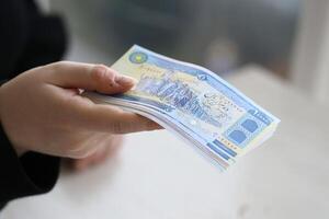contador da impuesto regreso dinero en iraní riales dinero en efectivo. impuestos período y anual contribuyentes rutina foto