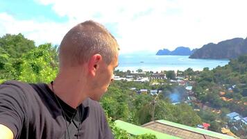 Tourist at Koh Phi Phi Thailand island viewpoint panorama view. video