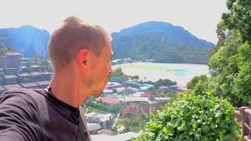 Tourist at Koh Phi Phi Thailand island viewpoint panorama view. video