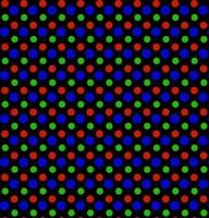 Vector seamless texture in the form of an abstract pattern of colored dots on a black background