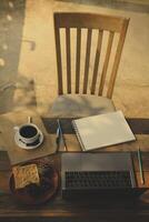 Coffee cup hot on wooden old table in the morning photo