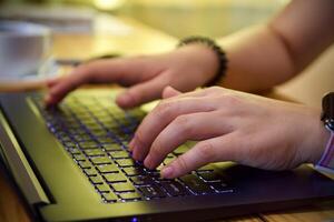 Women using working and drink coffee cup hot at home photo