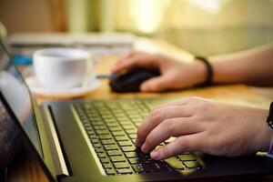 Women using working and drink coffee cup hot at home photo