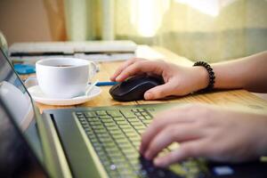 Women using working and drink coffee cup hot at home photo