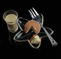 Color japanese sweets daifuku mochi with glass of irish cream liqueur photo