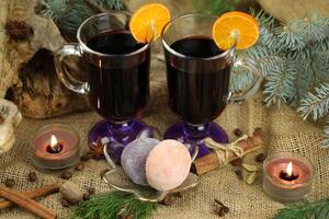 Glasses with mulled wine and spices photo