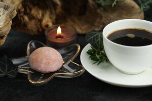 Cup of hot coffee with japanese sweets daifuku mochi photo