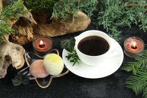 Cup of hot coffee with japanese sweets daifuku mochi photo