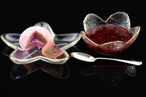 Color japanese sweets daifuku mochi with jam photo