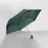 Opened umbrella isolated on white background with clipping path. Umbrella with handle for mock up. copy space, design template for mock-up, branding, advertise etc. Studio Photography shoot photo