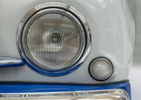 Headlight of old vintage car photo