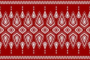 Ethnic ikat seamless pattern traditional. Carpet tribal style. Aztec ornament print. Red background. vector