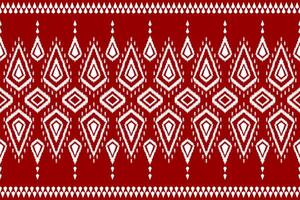 Ethnic ikat seamless pattern traditional. Carpet tribal style. Aztec ornament print. Red background. vector