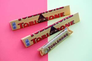 KYIV, UKRAINE - OCTOBER 31, 2023 Yellow Toblerone Chocolate Bar. Toblerone originated in Switzerland around 1908 photo